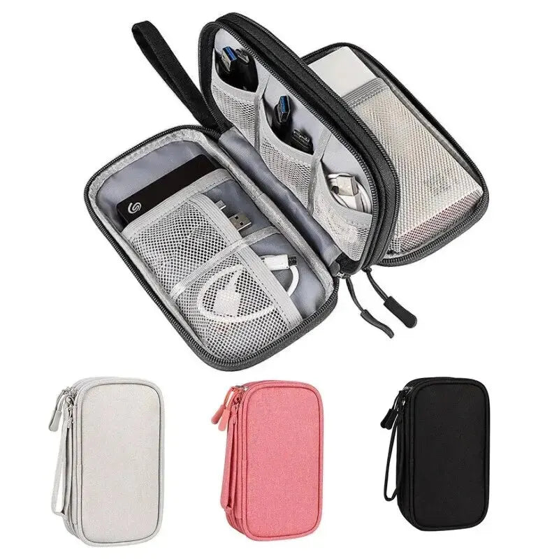 Organizer case open showing compartments and cables